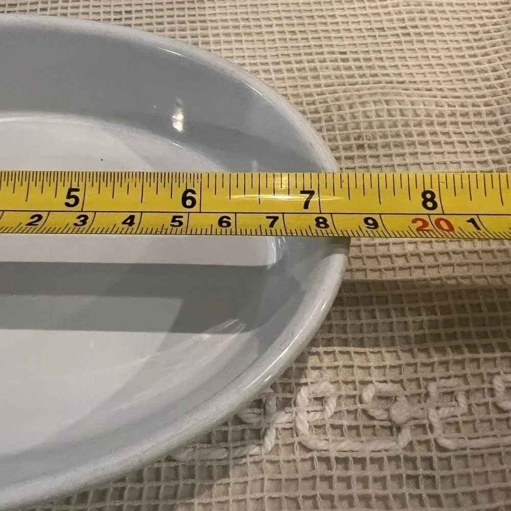 2 pieces Emile Henry escargots dish and oval baking dish.  Made in France.
